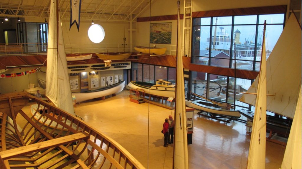 Interior of the Maritime Museum of the Atlantic in Halifax showing historic wooden boats and sailing vessels on display, Nova Scotia